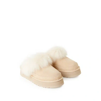 Ugg Mules À Fourrure En Cuir In Yellow