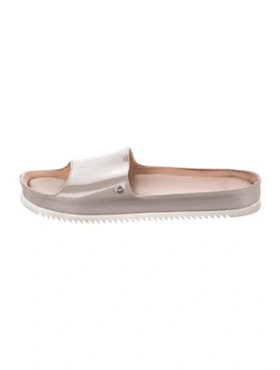 Pre-owned Ugg Patent Leather Slides In Yellow