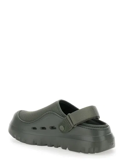 UGG 'PEAKMOD' GREEN MULES WITH ADJUSTABLE STRAP AND LUG SOLE IN TECH FABRIC MAN