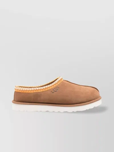 UGG SHAGGY SUEDE CLOGS BRAIDED HEM