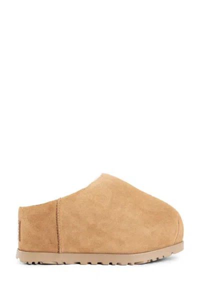 Ugg Round Toe Suede Mules With Rubber Sole In Brown