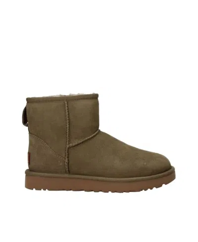 Ugg Snow And Bare Boots In Green