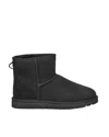 Ugg 'classic Mini' Black Ankle Boots With Logo Patch On The Rear And Shearling Lining In Suede Man In Black