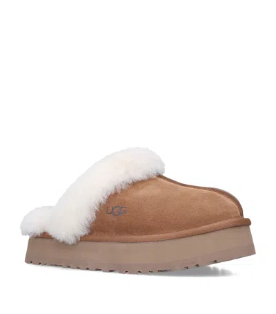 UGG SUEDE PLATFORM SLIPPERS