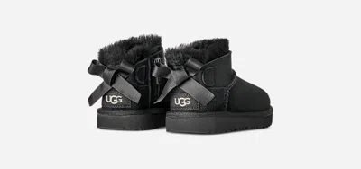 Ugg ® Toddlers' Ultra Mini Bailey Bow Sheepskin Classic Boots In Black