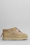 Ugg Ultra Mini Crafted Low Heels Ankle Boots In Beige