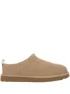 Ugg Slippers Flat Sole Pull Tab Round Toe In Sand