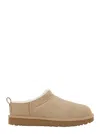 Ugg Slippers Flat Sole Pull Tab Round Toe In Sand