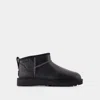 Ugg Classic Ultra Mini Leather Cozy Ankle Boots In Black