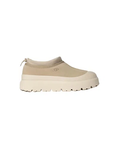 UGG UGG WEATHER-RESISTANT SLIP-ON SHOES WITH SHEEPSKIN LINING