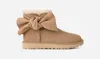 Ugg Classic Mini Bow Boots In Brown