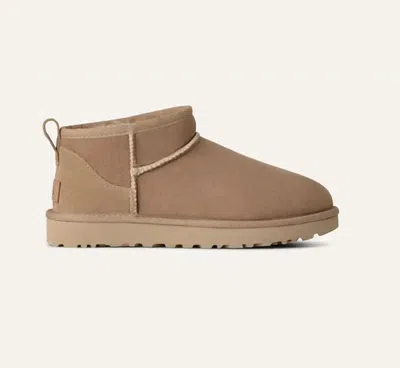 Ugg Women's Classic Ultra Mini Booties In Sand In Beige