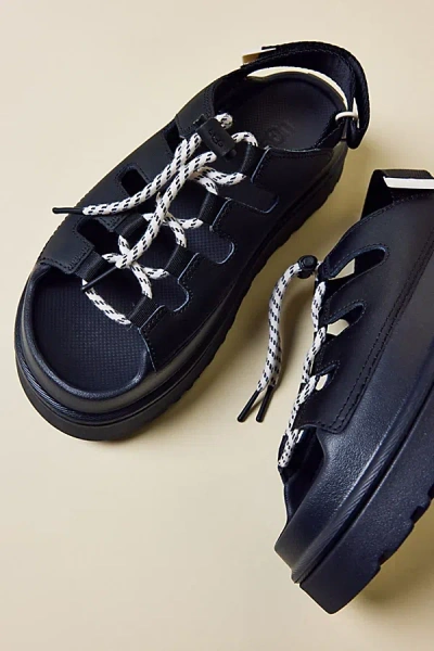 UGG WOMEN'S GOLDENGLOW TOGGLE SANDALS IN BLACK, WOMEN'S AT URBAN OUTFITTERS