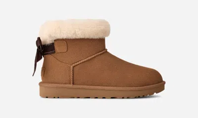 Ugg ® Women's Mini Bailey Mixed Bow Suede Classic Boots In Chestnut In Brown