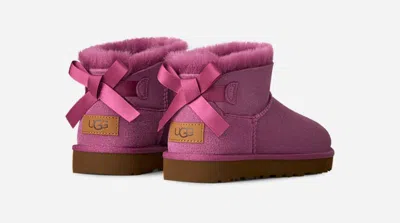 Ugg ® Women's Ultra Mini Bailey Bow Sheepskin Classic Boots In Dark Winterberry