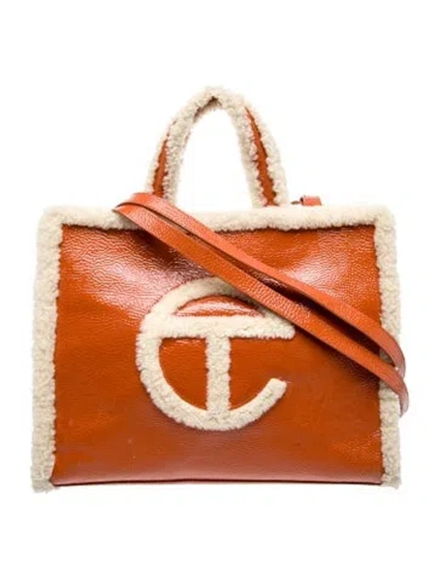 Pre-owned Ugg X Telfar Patent Leather Crinkle Shopping Pumpkin Medium In Orange