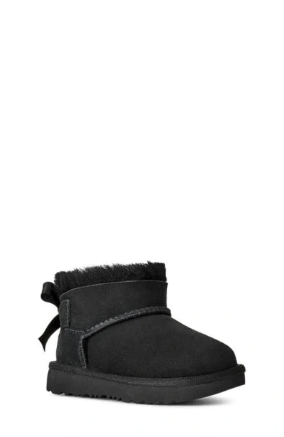Ugg Babies' (r) Kids' Ultra Mini Bailey Bow Genuine Shearling Boot In Black