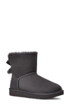 Ugg (r) Mini Bailey Bow Ii Genuine Shearling Bootie In Black