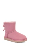 Ugg(r) Mini Bailey Bow Ii Genuine Shearling Bootie In Dusty Orchid