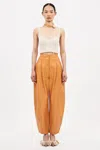 Ulla Johnson Sloane Pleated Tapered Wide-leg Leather Pants In Chestnut