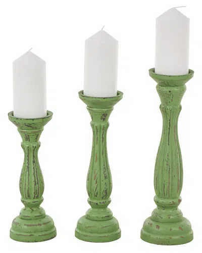Uma Enterprises Set Of 3 Distressed Turned Pillar Candle Holders In Green