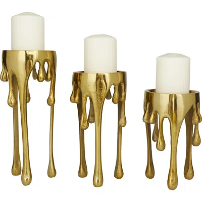 Uma Set Of 3 Melting Wax Pillar Candleholders In Gold
