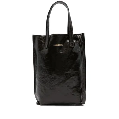 Uma Wang Carry A Handbag With Both Hands In Black