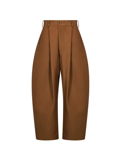 Uma Wang Pleated Tapered Trousers In Brown