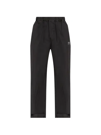 Umbro Logo-embroidered Touch-strap Trousers In Black