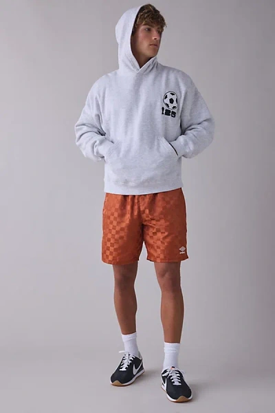 Umbro Uo Exclusive Checkerboard Pattern 7" Shorts In Gingerbread, Men's At Urban Outfitters In Orange