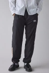 Umbro Uo Exclusive Relaxed Wind Pant In Black/golden Yellow, Men's At Urban Outfitters