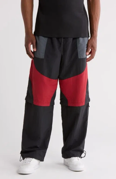 Umbro Zip Off Loose Fit Pants In Black