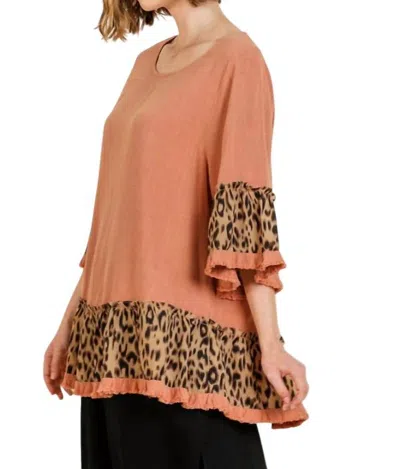 Umgee Animal Print Ruffle Hem Top In Peach In Orange