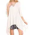 Umgee Crossed Bell Sleeve Asymmetrical Tunic In Ivory In Neutral