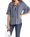 Umgee Lace Up Bell Sleeve Top In Navy In Blue