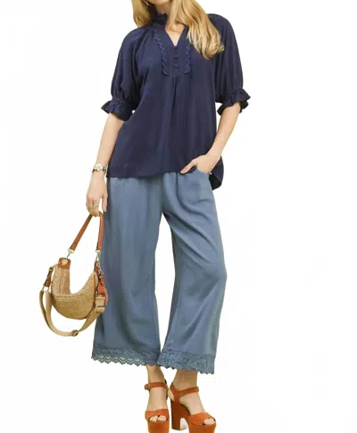 Umgee Scalloped Ruffle Neck Top In Navy In Blue