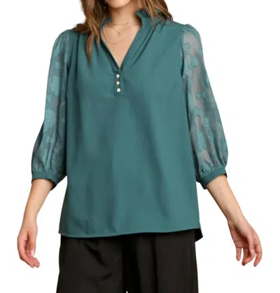 Umgee Sheer Sleeve Ruffle Neck Blouse In Lagoon In Green