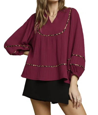 Umgee Texture Fabric Blouse With Animal Print Trim In Burgundy