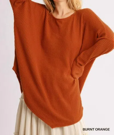 Umgee Women's Waffle Knit Asymmetrical Hem Top In Burnt Orange