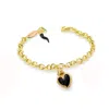 Unaloe Women's Gold / Black Gold-plated Silver Bracelet With Black Heart Pendant And Horn