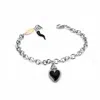 Unaloe Women's Silver / Black Silver Bracelet With Black Heart Pendants And Horn