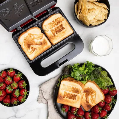 Uncanny Brands Jurassic Park Grilled Cheese Maker In Multi