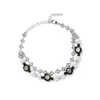 Undefined Jewelry Women's Black / Silver / White Smile La Beaded Layered Bracelet Mmrz In Multi
