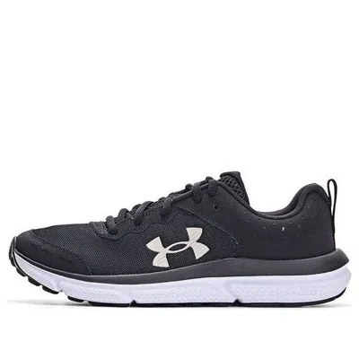 Under Armour (gs)  Assert 10 Ac 'black Metallic Gold'