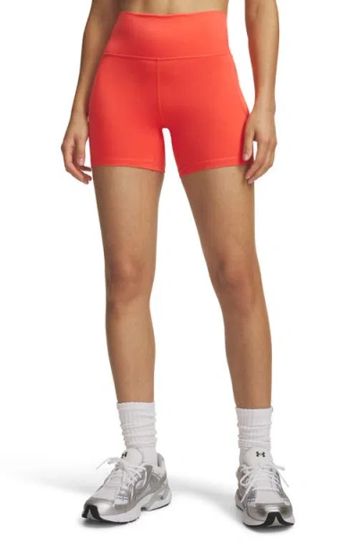 Under Armour Meridan Middy High Waist Bike Shorts In Orange