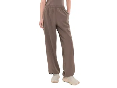 Under Armour Rival Woven Core Pants Women's Clothing Peppercorn/black: Lg (us 12-14) R In Brown