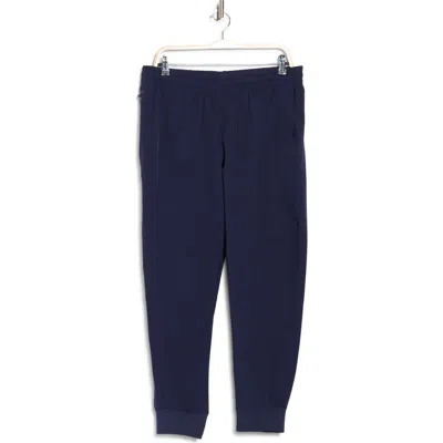 Under Armour Sportswear Ua Storm Water Repellent Performance Joggers In Blue