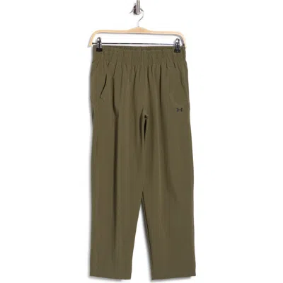 Under Armour Ua Sportswear Storm Water Repellent Performance Woven Pants In Green
