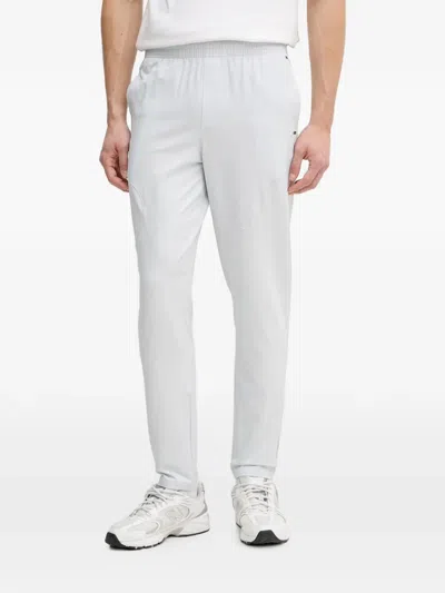 Under Armour Ua Unstoppable Logo-patch Elasticated-waistband Trousers In White