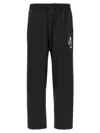 Undercover Trousers Graphic Print Elastic Waistband In Black